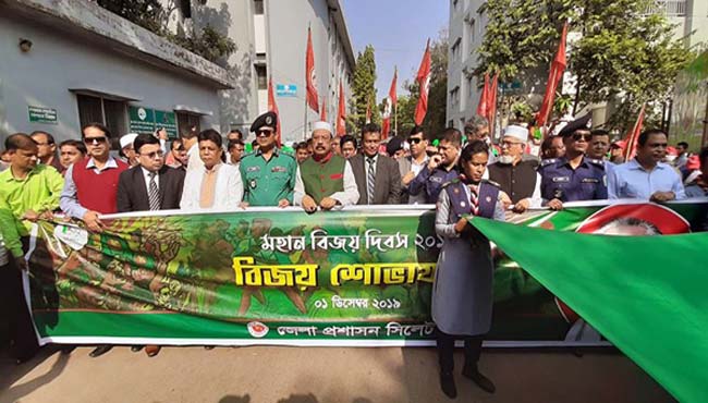 সিলেটে বিজয়ের মাস বরণে জেলা প্রশাসনের বর্ণাঢ্য শোভাযাত্রা